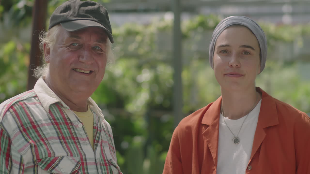 Portrait of Nurseryman with Female Colleague at Work