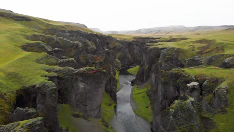 spectacular eroded cliffs of fjadrargljufur river canyon in iceland