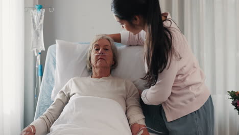 Woman,-nurse-and-patient-in-elderly-care-on-bed