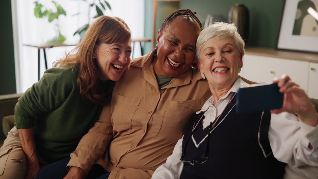 Three mature women taking a selfie