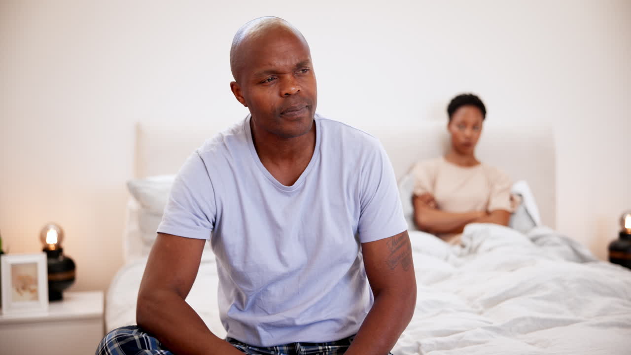 Stress, angry and black couple in bedroom