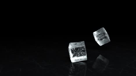 cubos de hielo en mármol negro