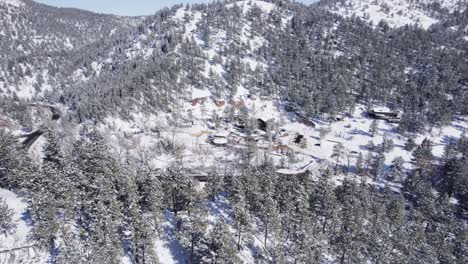 Cabin-in-the-Mountains-Reveal-in-Boulder-Canyon,-Colorado---Aerial-Drone-Footage---Daytime