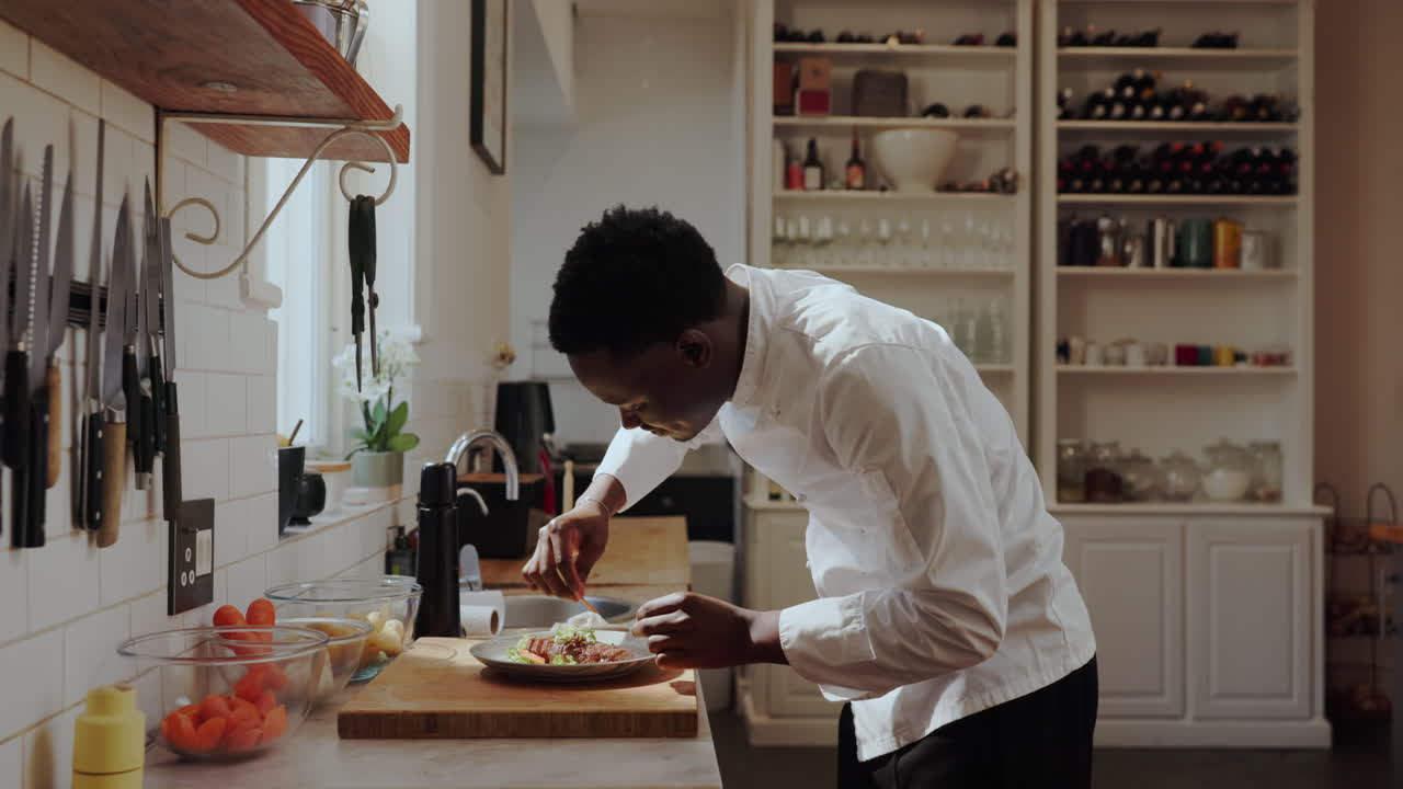 Chef preparing a meal in the kitchen