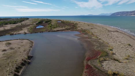 lagoon with shallow, turbid waters of wetlands nature park, sanctuary intertidal seashore in adriatic coastline