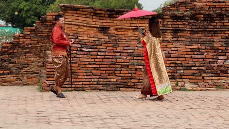 tourists meet locals near ancient temple ruins