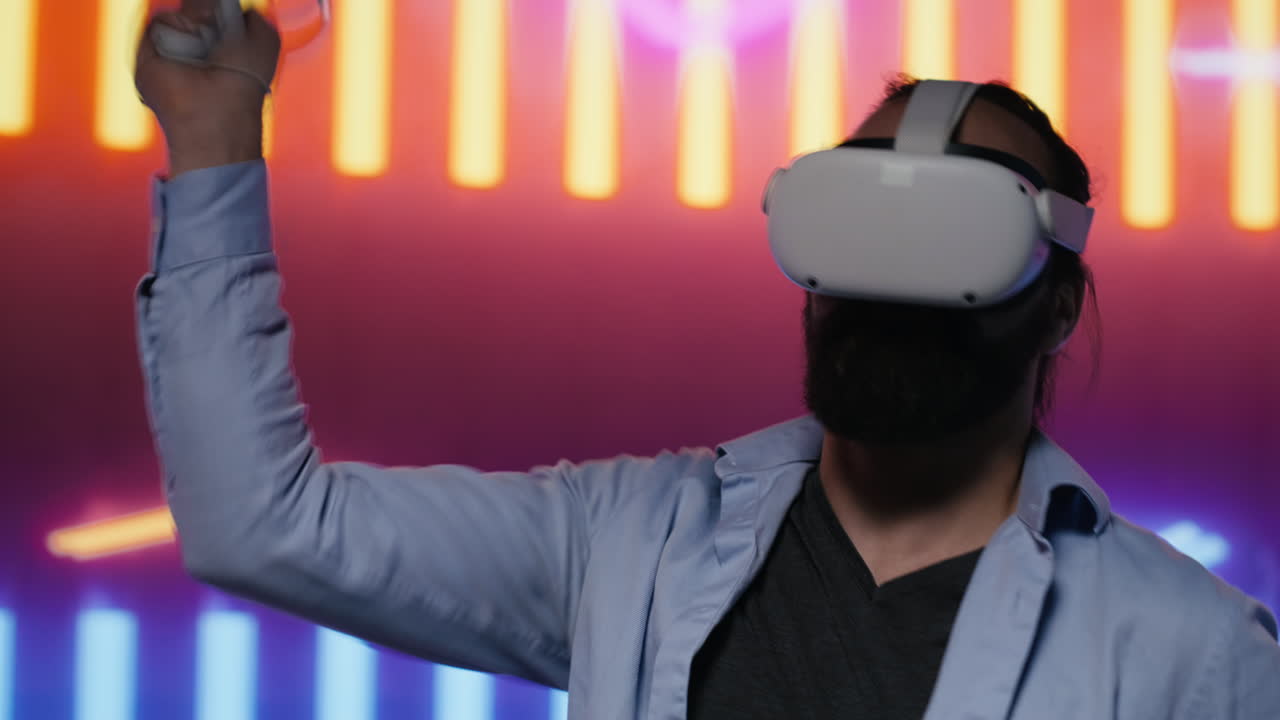 Stylish young man reflects artistic vibes by using virtual reality headset