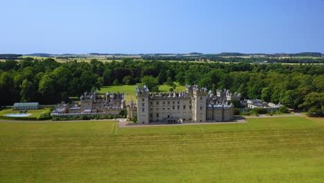 floors castle aerial in scottish borders, famous landmark in kelso, scotland, united kingdom