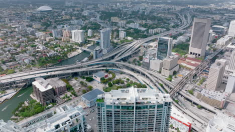High-angle-view-of-complex-highway-interchange-in-large-city.-Individual-transport-and-infrastructure-traffic.-Miami,-USA