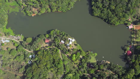aerial shot overhead a lake in the countryside of cerro azul, panama