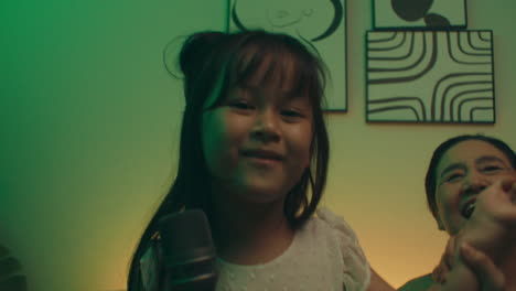 family singing and dancing at home