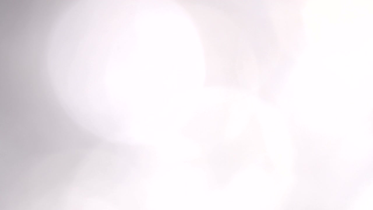 partículas de chispas abstractas que se mueven pequeñas grandes desenfocadas