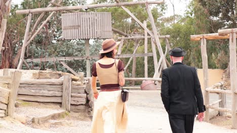 a couple explores a historical outdoor area