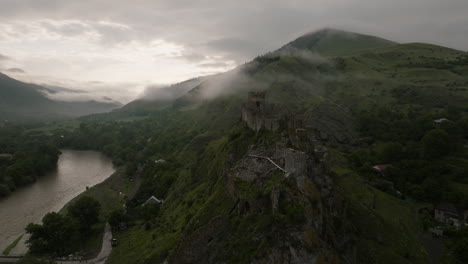 Atskuri-Fortress-On-The-Rocky-Hill-Over-Kura-Riverbank-On-A-Misty-Morning-In-Georgia