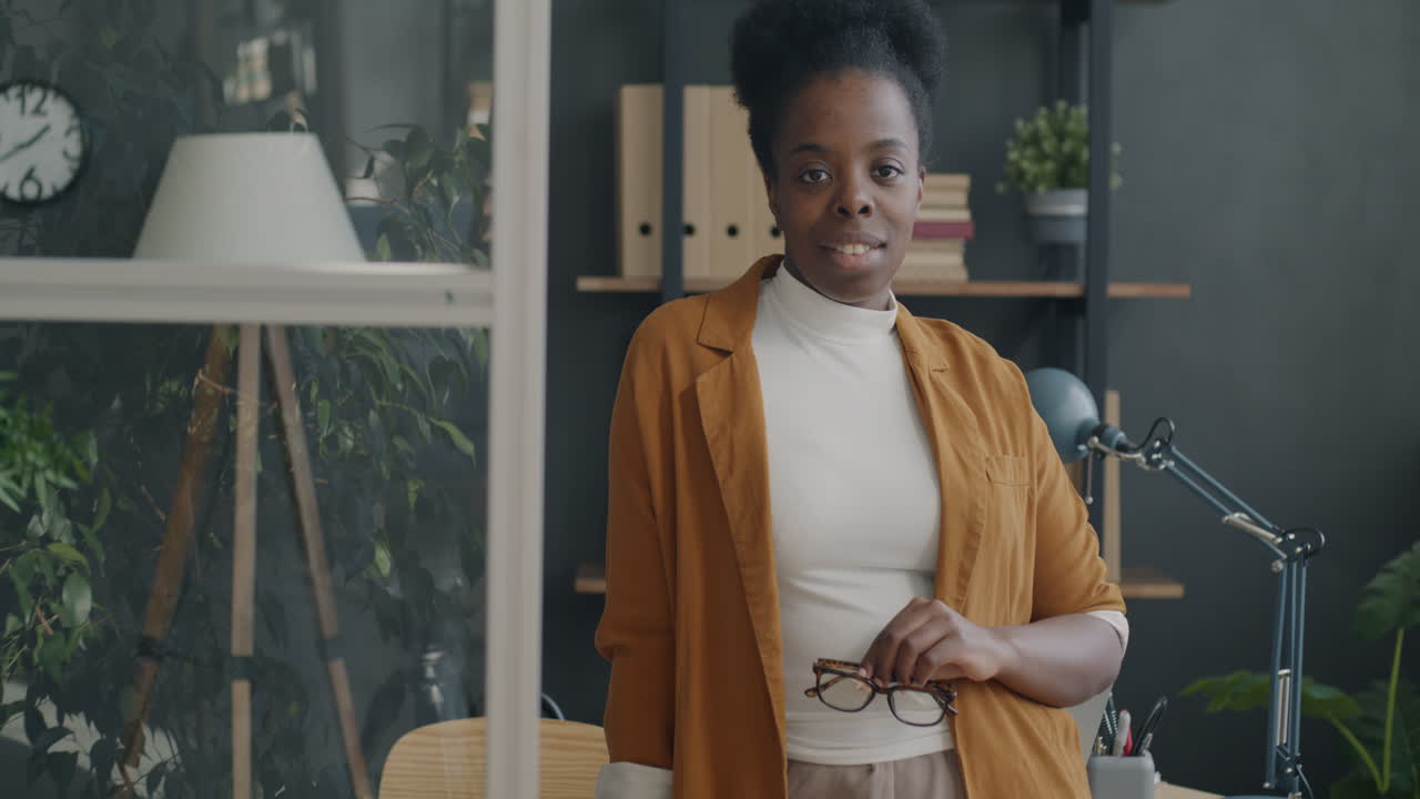 Smiling Professional Woman in Modern Office