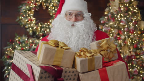santa claus with christmas gifts
