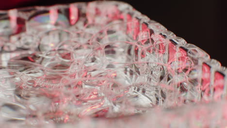 close-up of bubbles in a glass dish