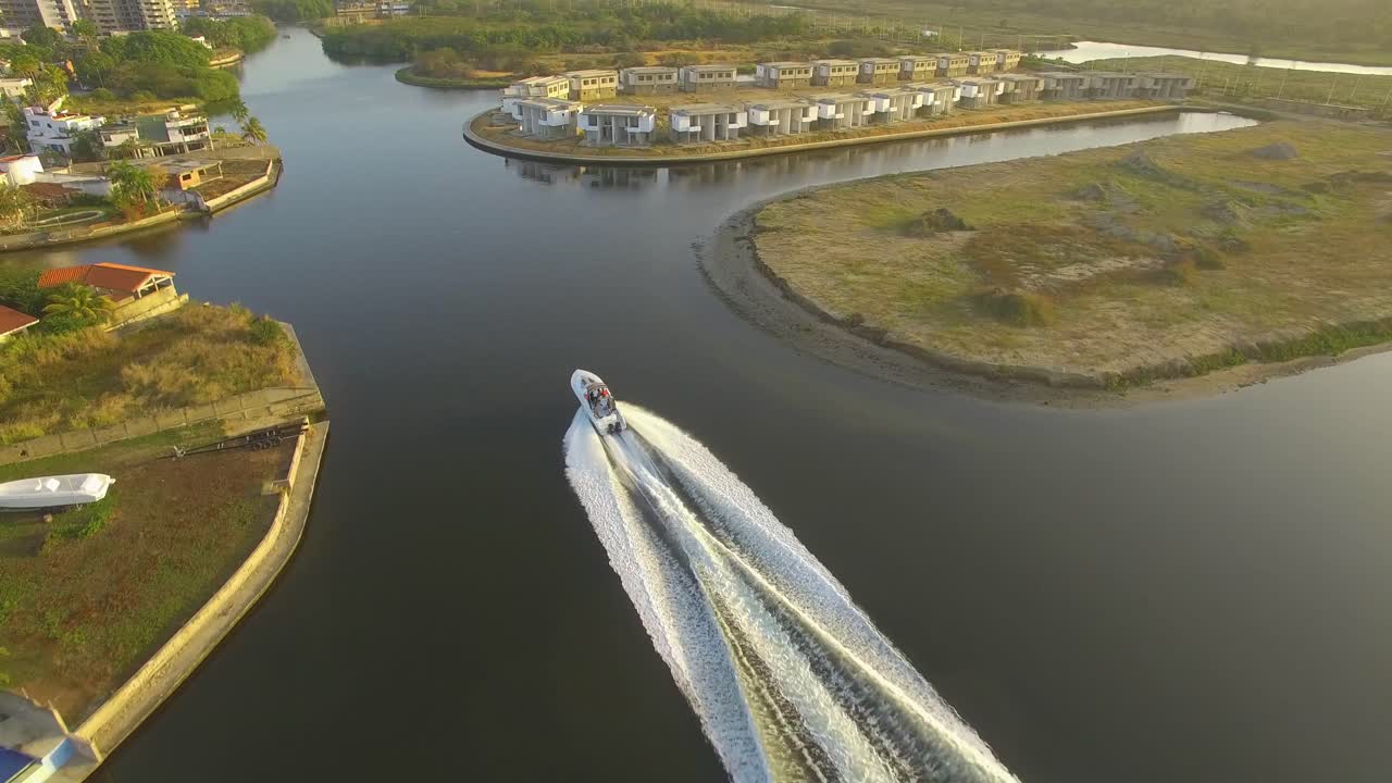 Aerial view of a yacht sailing in the Hiterote canals, Venezuela, during the golden hour