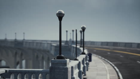 empty bridge fragment near the mountains