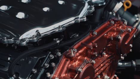 arc shot of a spotless shiny modified engine at car show