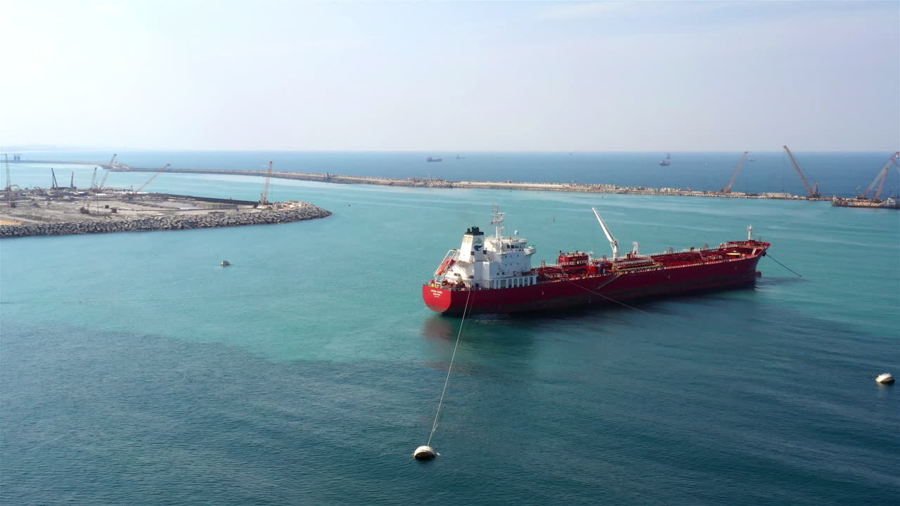 Red Cargo Ship on the Open Sea