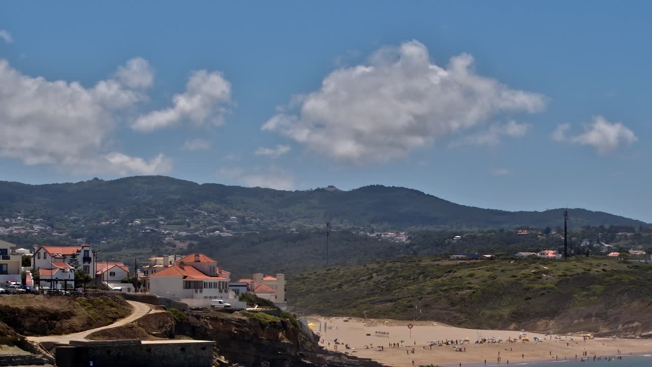 Aerial view of beach and buildings in Portugal on a clear day