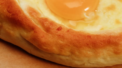 close-up of a delicious pide with egg