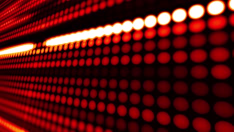 filas de diodos luminosos led rojos que brillan y se oscurecen sobre un fondo oscuro