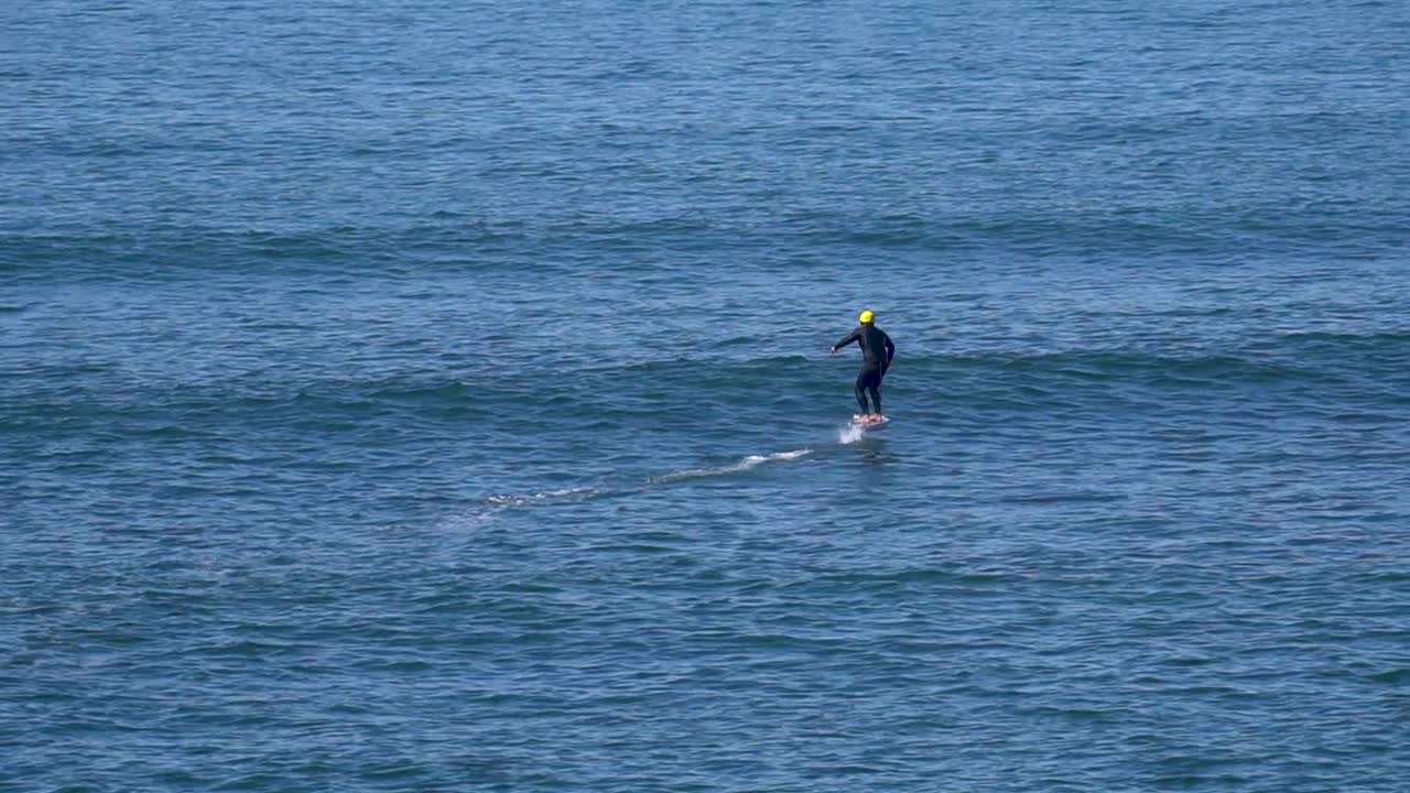 Water sport Wave surfing riding the wave in Carcavelos, Lisbon Portugal