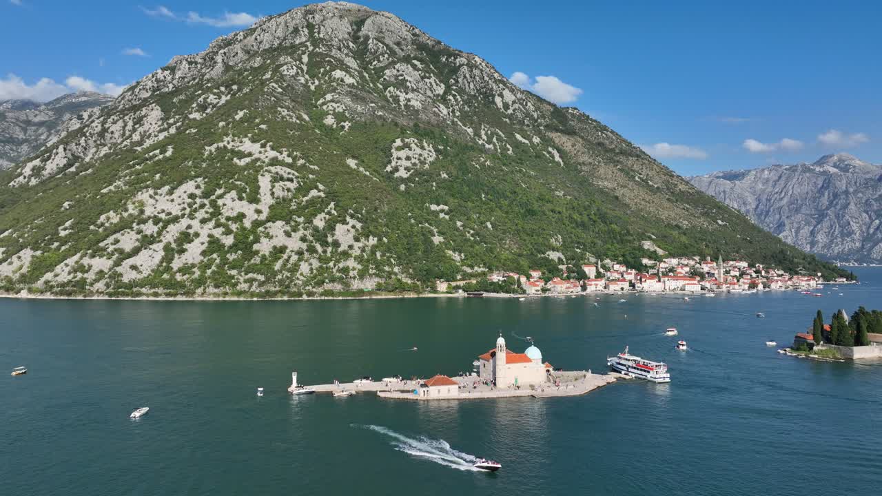 Drone view of the Monastery of Our Lady of Mercy in Montenegro on a sunny summer day.