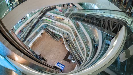 timelapse view of shoppers at luxury mall in hong kong, china