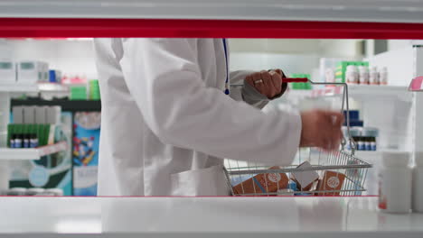 pov of medical employee placing all medicaments in boxes or bottles