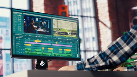 videographer professionally adjusting clips using mockup pc monitor