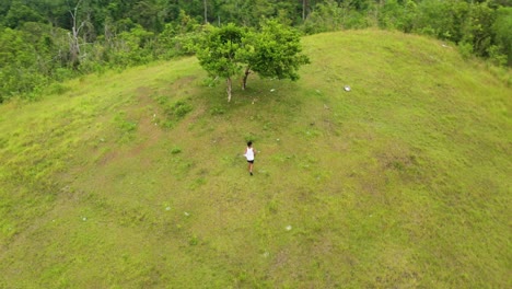 Active-Person-Climbing-In-The-Peaceful-Hilltop-Of-Tomas-Oppus-Municipality,-Leyte,-Philippines