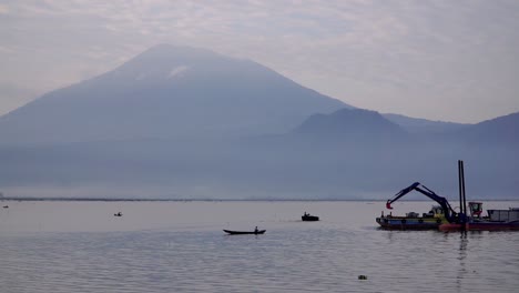 lake with mountain on the background in rawa pening, semarang, indonesia