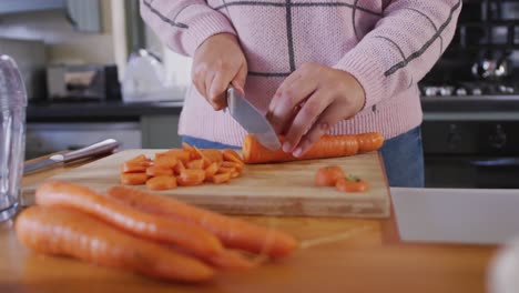 caucasian vlogger woman cooking at home