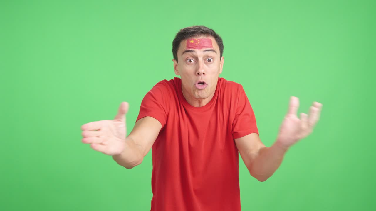 Man Cheering for China, angry with the decision of referee