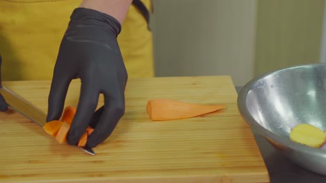 chef chopping carrots