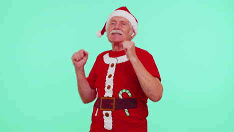 Senior-Christmas-old-grandfather-man-listening-music-via-earphones,-dancing-fun-disco-fooling-around