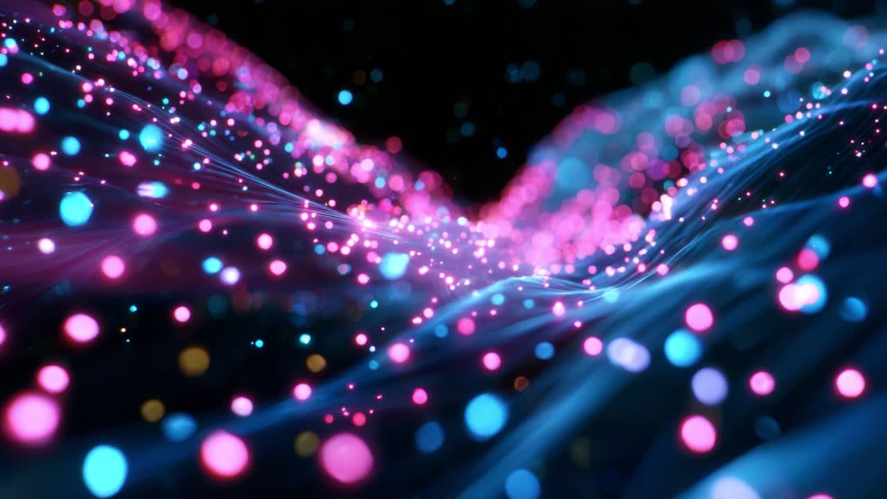 A Mesmerizing Display of Light: Vibrant Particles Dance in a Flowing Stream of Colors, Creating a Kaleidoscopic Effect Amidst a Dark Background That Captivates the Viewer with Its Ethereal Beauty