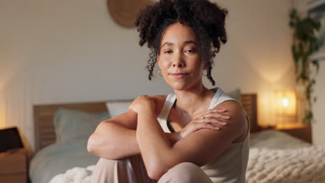 woman sitting comfortably on a bed