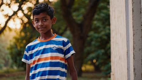 smiling boy in a striped shirt