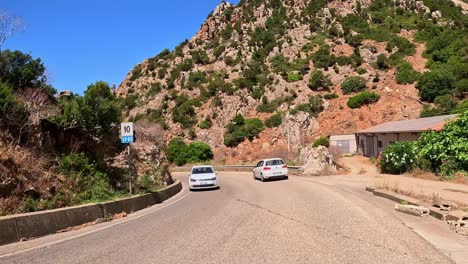 serpentine road drive: green hills and stunning coastal sea views await