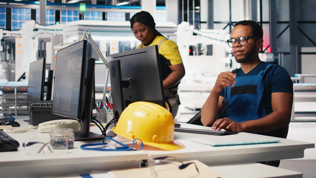 Vertical Video Solar energy expert updates design models in eco friendly factory