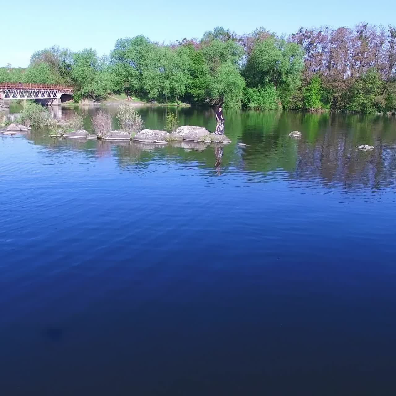 Cyclist on the shore