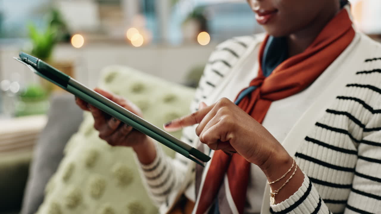 Woman using tablet at home