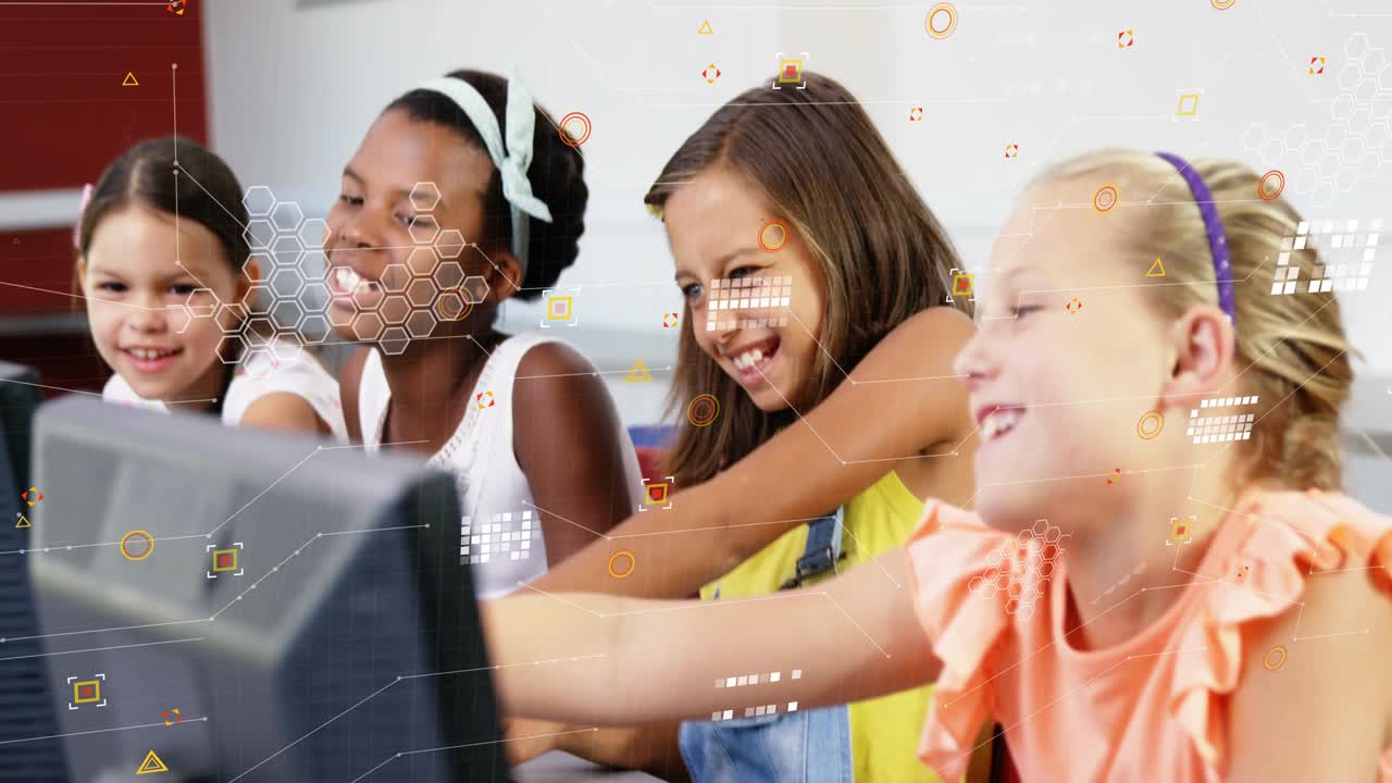 Camera focusing on keyboards girls leaning and typing at class monitor HUD overlay guiding learning
