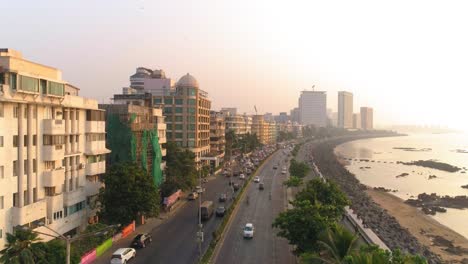 drone shots of the most iconic walkway of south bombay, marine drive, also known as the queen's necklace as seen before the great mumbai coastal road is made