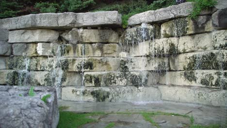 whitby stone decorative waterfall in a garden in canada