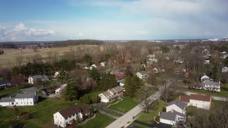 drone footage over peaceful suburb residential area in chesterbrook, pennsylvania, usa